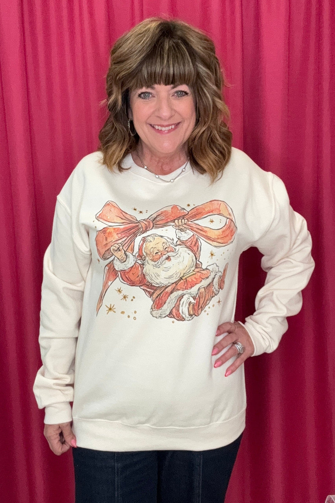 Santa Holding a Bow Sweatshirt MISSY BASIC KNIT SUGAR STITCH